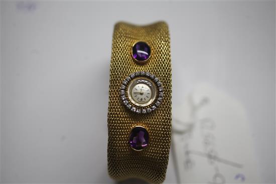 A ladys 18ct gold, cabochon amethyst and diamond set Zenith manual wind bracelet watch,